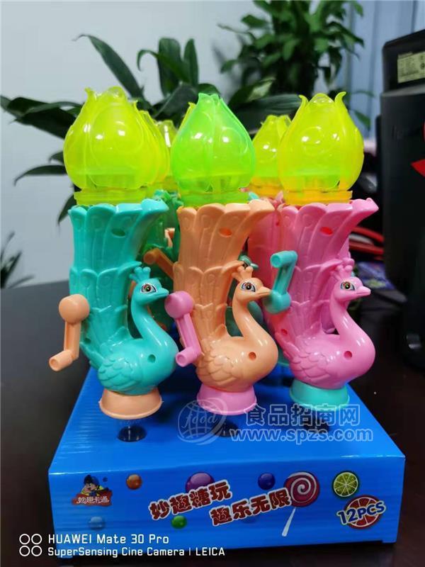 手摇闪光孔雀儿童糖玩厂家批发加盟代理