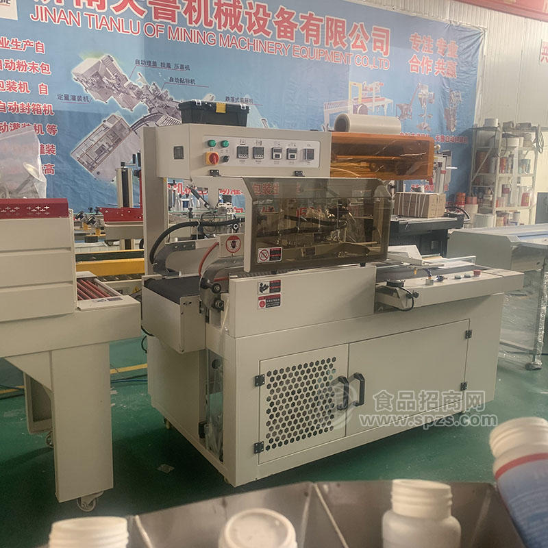 天鲁全自动边封缩膜机 济南饼干套膜收缩机