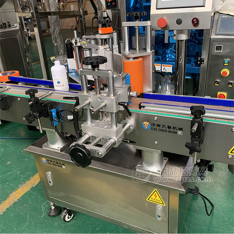 天鲁圆瓶定标贴标机 济南饮料瓶贴标签机